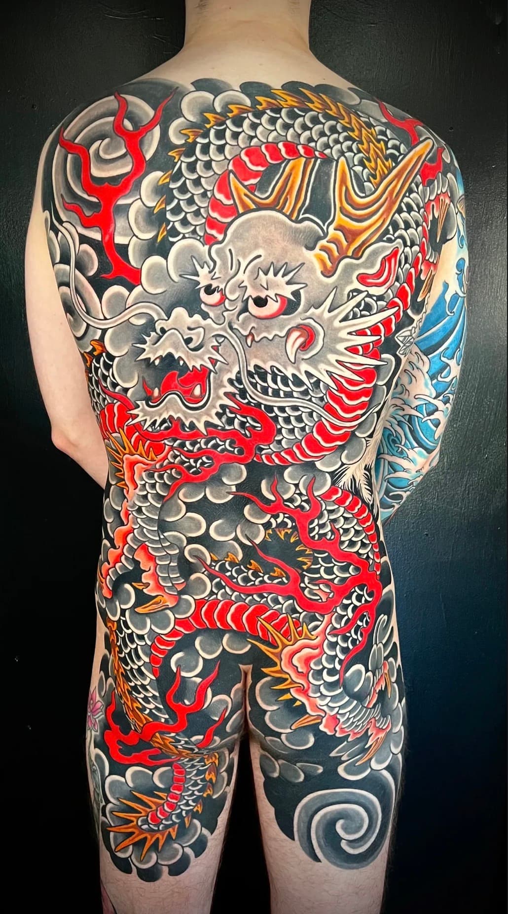 Chopper tattooing a traditional Japanese piece in St. Petersburg FL